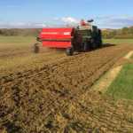 land with tractor on it